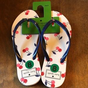 Authentic Kate Spade Flip Flops. Design called Dancing Cherries. New with tag.